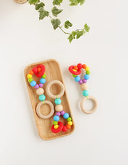 silikoninis kramtukas ERIN ryškus | silicone teething toy with wooden ring